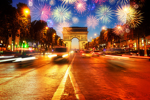 Arc de Triomphe and Champ Elysees at night with fireworks, Paris, France