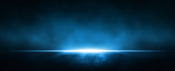 istock Asphalt blue dark street with smoke. Rays, spotlights light . Empty dark scene with neon light. 1347837115