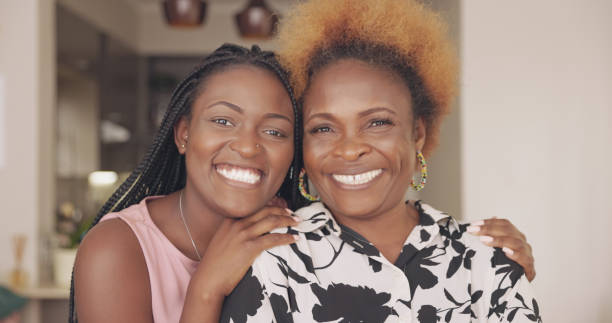 Shot of a mom and daughter spending time at home stock photo