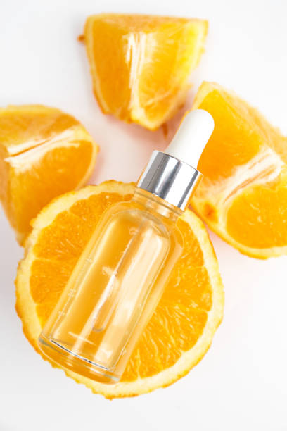 istock Oranges and essential oil on white background. Natural medicine concept. Aromatherapy 1347840277