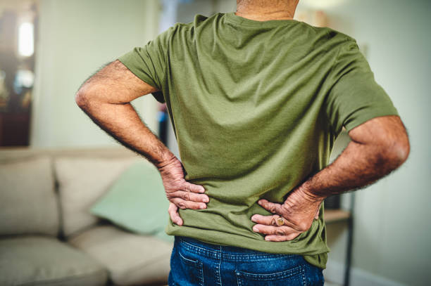 Cropped shot of a senior man suffering from back pain I think I should pay the physiotherapist a visit back pain stock pictures, royalty-free photos & images