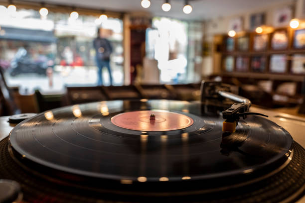 Close-up vintage record player, While playing the record, Black platter.