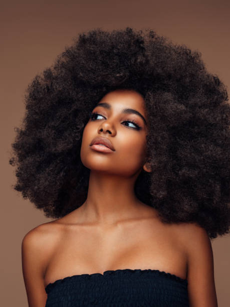istock Beautiful girl with curly hairstyle 1347845668