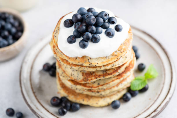 istock Pancakes with yogurt and blueberries 1347848766