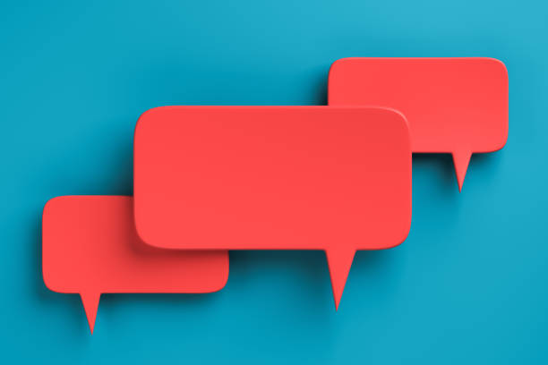 istock Social media notification icons, red speech bubbles on blue background. 1347852662