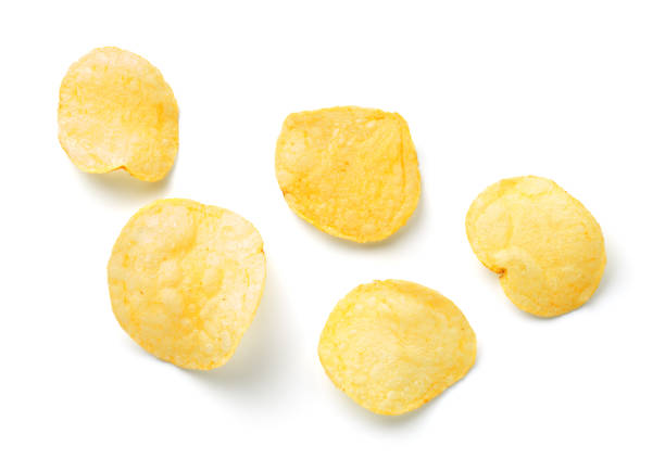 istock Salty Potato Chips Isolated On White Background 1347854644