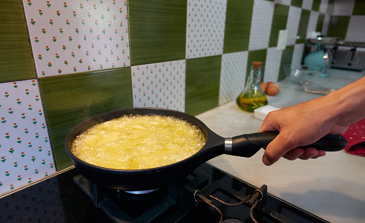 cooking a Spanish omelette step by step