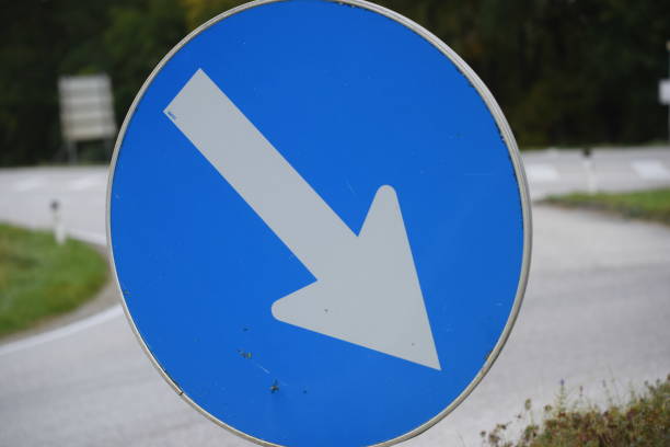 istock Direction sign in road traffic 1347857435