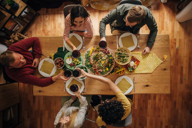 istock Group of friends dining together 1347859074