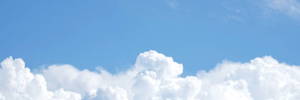 istock Air clouds in the blue sky banner.Blue backdrop in the air. Abstract style for text, design pattern 1347861612