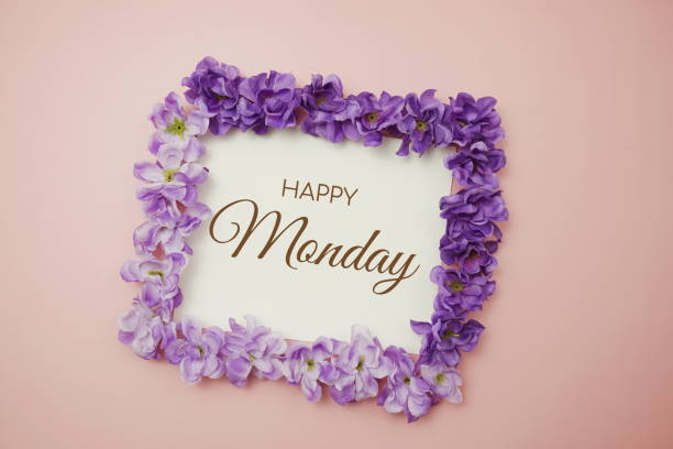 istock Happy Monday card typography text with flower bouquet on pink background 1347862778