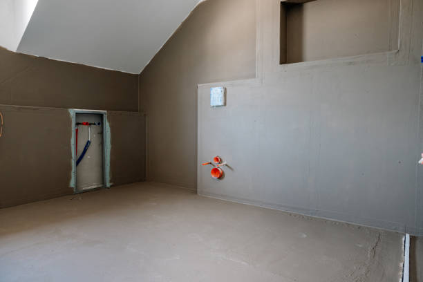 istock laying tiles in the bathroom 1347865081