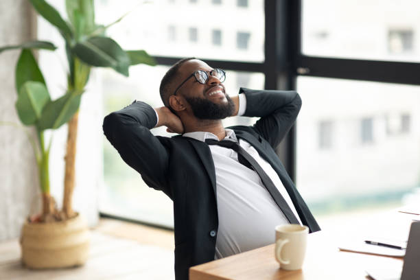 istock African American business man leaning back taking break 1347865631