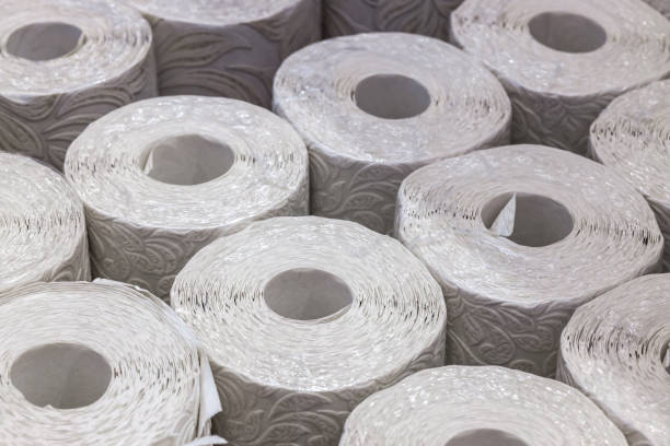 istock White wallpaper in rolls. General background, focus with a shallow depth of field. 1347866489