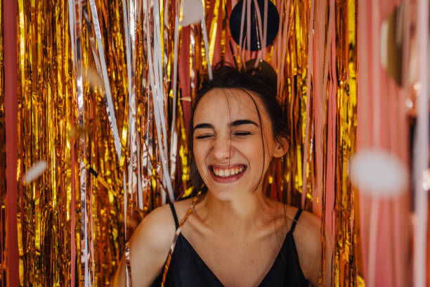 Smiling young woman at the party Photo of a smiling young woman at the party life events photos stock pictures, royalty-free photos & images
