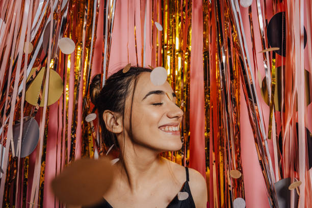 Photo of a smiling young woman at the party