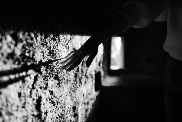 istock hand with a ring on a wall background stylish black and white photography 1347870446