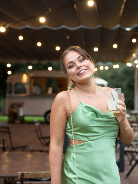 istock Elegant young woman at a party 1347874200