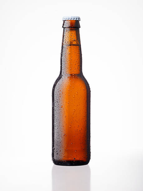 Beer Bottle XXXL Fresh beer bottle on white background beer bottle photos stock pictures, royalty-free photos & images