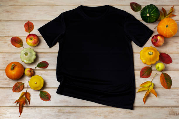 istock Unisex black T-shirt mockup with fall decor 1347876743