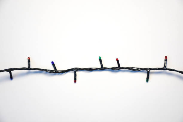 istock Christmas lights on the white background 1347878060