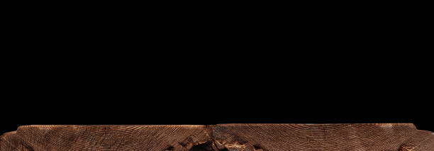 istock wooden textured surface on a black background 1347882591