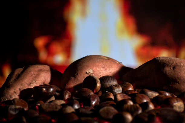 Sweet potatoes and chestnuts roasting over the fire