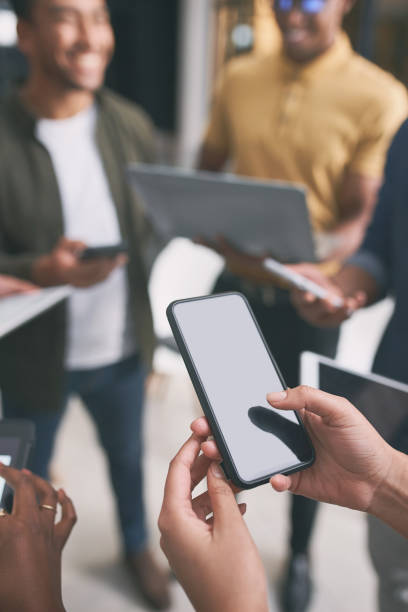 istock Shot of a unrecognizable  team of colleagues using digital tablets and 1347893219