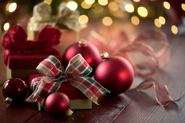 istock Christmas Gifts and Baubles with Bokeh Lights 1347894348