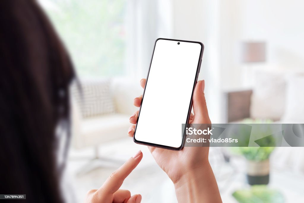 Modern phone mockup in woman hands Cyborg Stock Photo