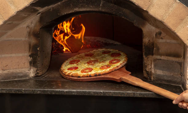 istock Brazilian pizza is cooked in a wood-fired oven. 1347900308