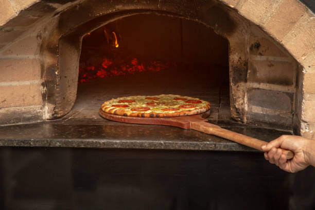 istock Brazilian pizza is cooked in a wood-fired oven. 1347900309