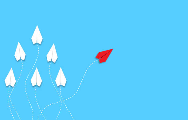 istock leadership or different concept with red and white paper airplane path and route line on blue background 1347900924