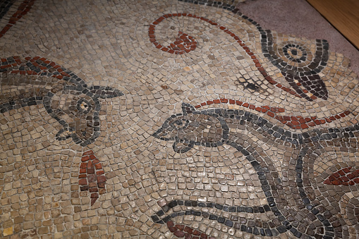 Bath, United Kingdom - November 2, 2017: Fragment of mosaic flooring of the Roman baths of Bath, Somerset