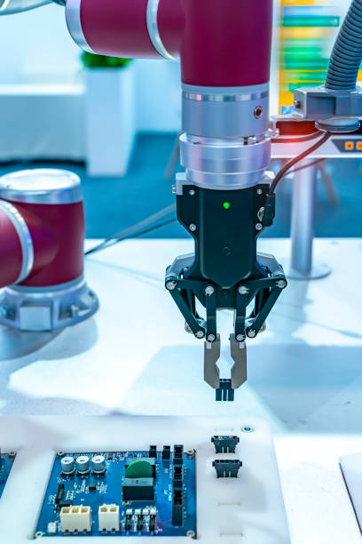 istock Automatic industrial robotic robot working, industry 4.0 and technology concept 1347902123
