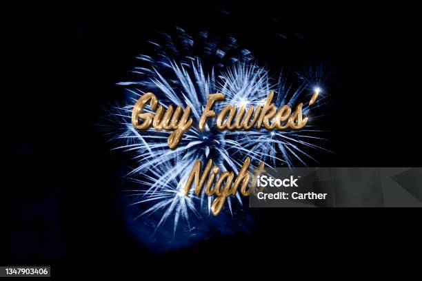 Guy Fawkes Night Text With Sparkling Gold Calligraphy Over Blue Slow Motion Fireworks Isolated On Black Background Stock Photo - Download Image Now