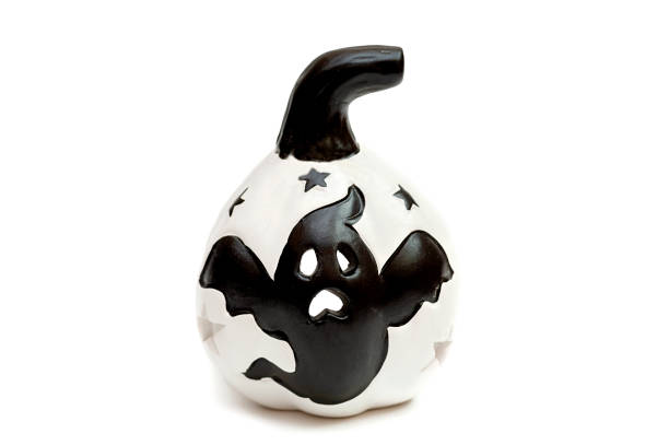 istock Candlestick pumpkin for Halloween isolated on white background 1347905065