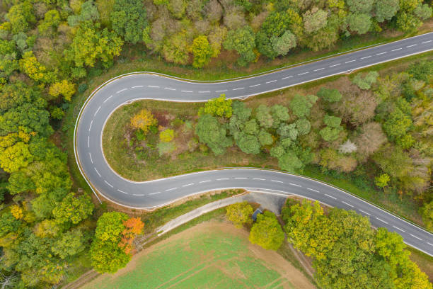 istock Curvy road into the valley 1347907200
