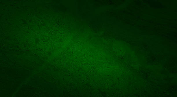 istock abstract dark green marble texture background. luxury Italian slab, granite texture with blank space for design. vignette limestone marble texture background (focused at center of image). 1347908218