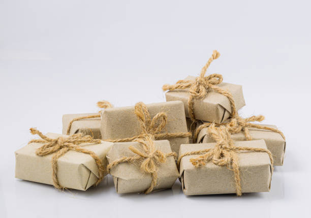 istock Brown gift on a white background,Stack of handcraft gift boxes on white background 1347909178