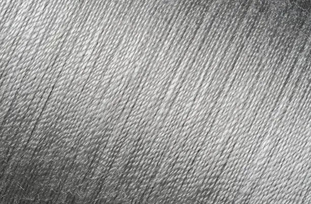 Close up picture of silver thread texture, diagonal line background image