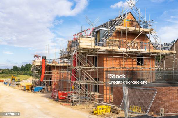 House Building In England Stock Photo - Download Image Now - Construction Site, Construction Industry, House