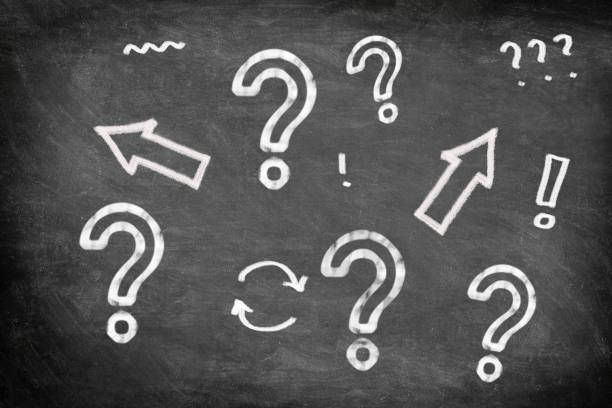 istock Blackboard chalkboard with hand drawn question mark and exclamation marks arrows drawings illustration for creativity, confusion, choice, startup business ideas, problem solving concept on black board 1347912311