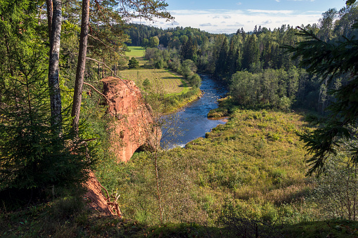 Zvartes Rock is one of the most picturesque sandstone cliffs on the banks of the Amata River, Gauja National Park