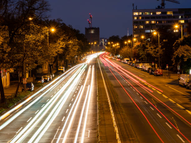 istock light trails on a city highway. Night city 1347913656