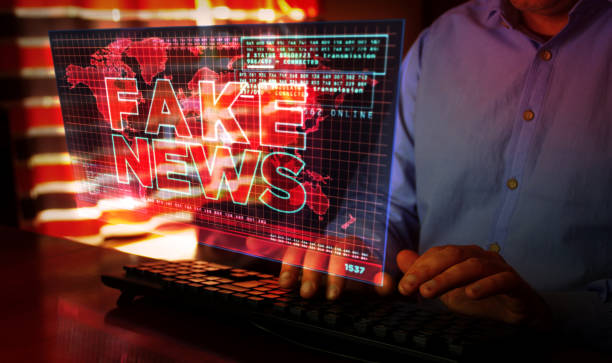 istock Fake news trolling and broadcast on screen illustration 1347915653