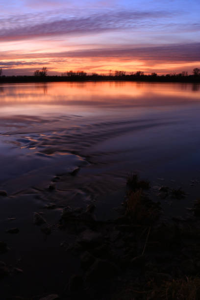 istock Colorful sunset by the Odra River, Poland. 1347917692