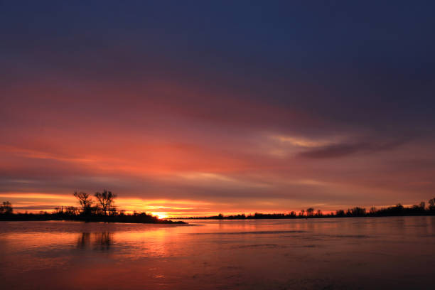 istock Colorful sunset by the Odra River, Poland. 1347918334