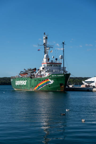 The Greenpeace Arctic Sunrise ship docked in Pula, Istria  late in the day Pula, Istria, Croatia - 14.10.2021: The Greenpeace Arctic Sunrise ship docked in Pula, Istria  late in the day greenpeace stock pictures, royalty-free photos & images