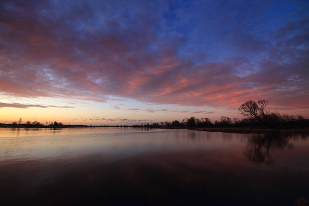 istock Colorful sunset by the Odra River, Poland. 1347918419